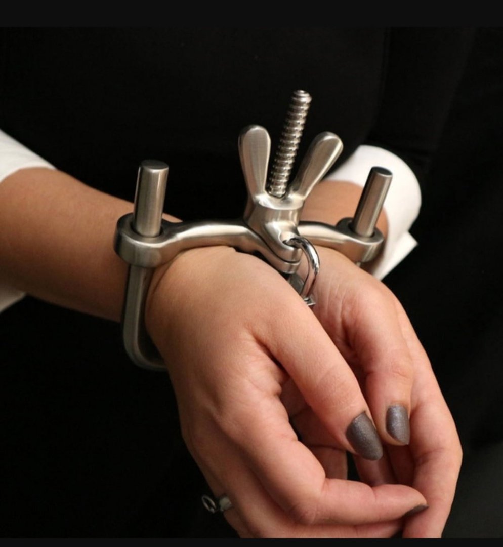 A chair with handcuffs