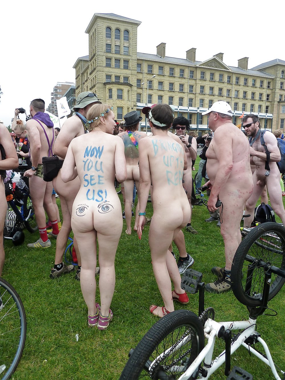 Parade of naked men and women