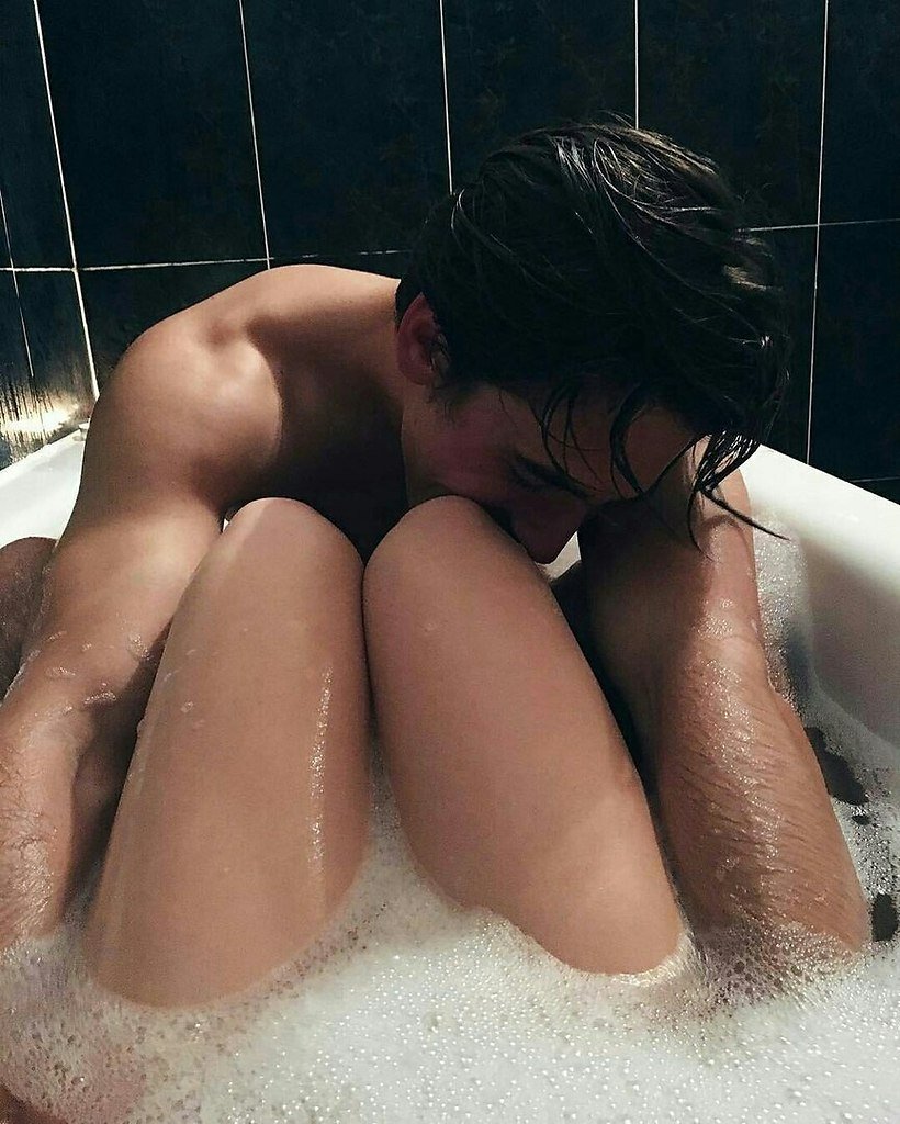 A guy with a girl in a bath