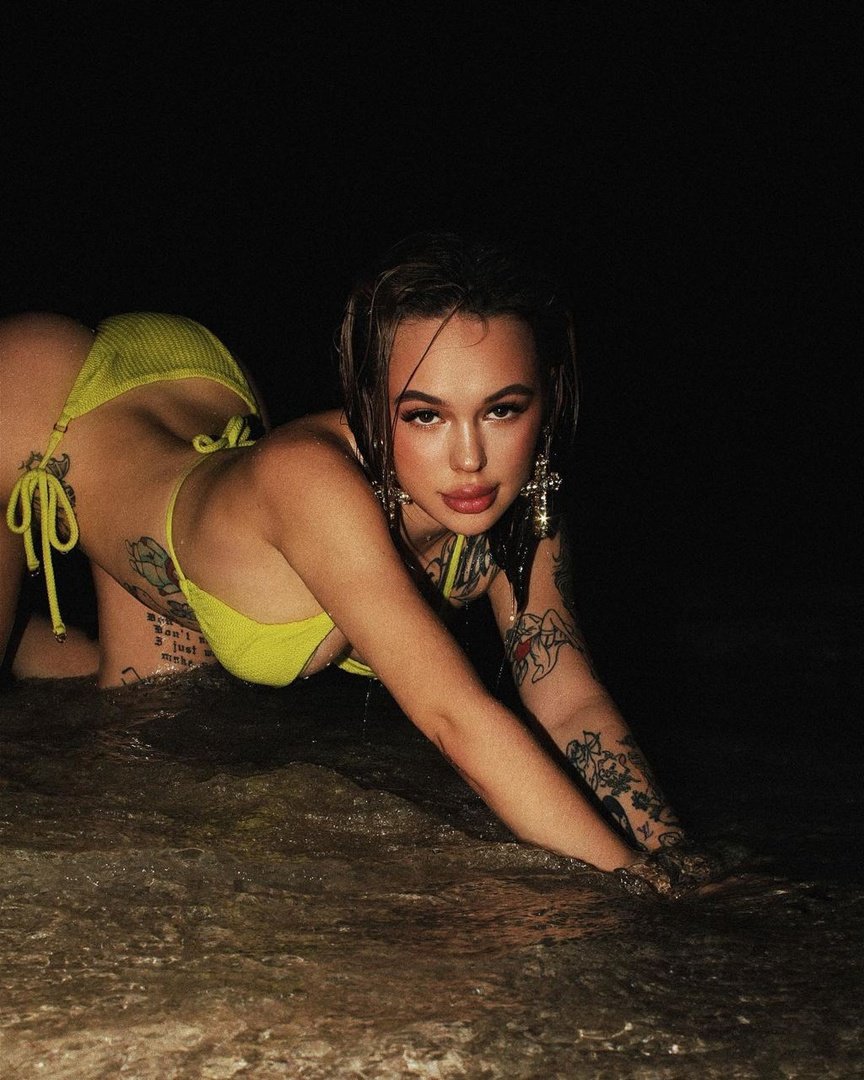 Valya Carnival in a leopard swimsuit