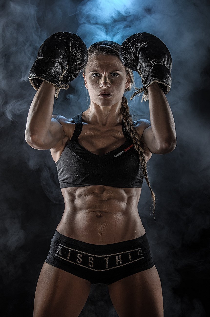 The girl is engaged in boxing