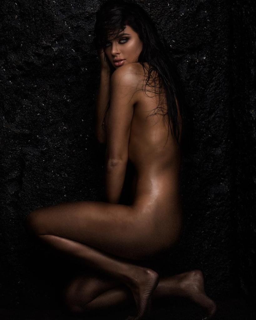 Naked beauty on a fur blanket