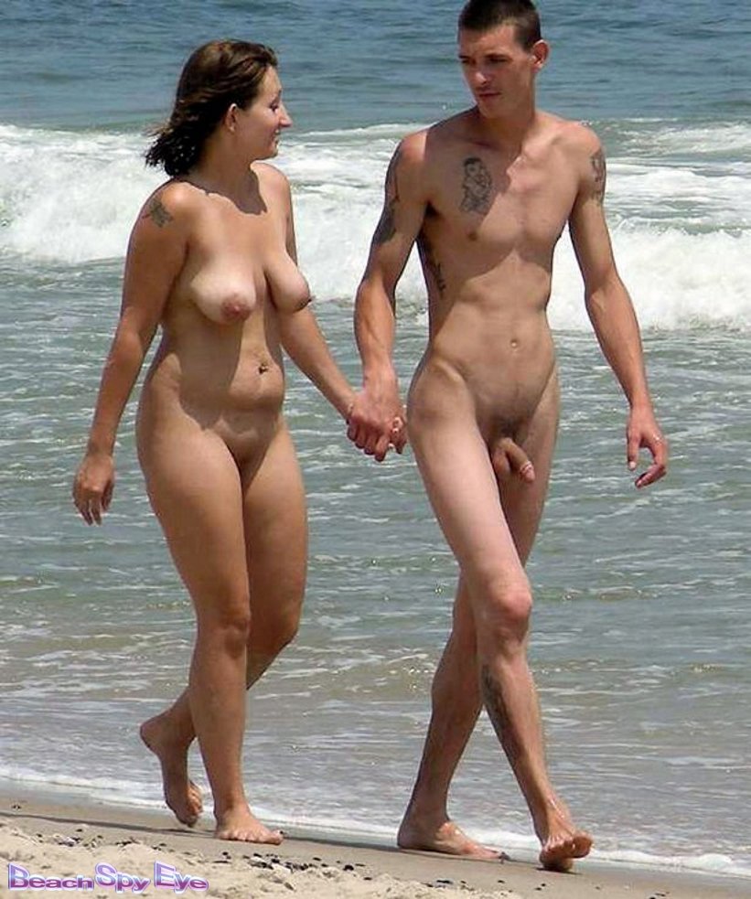 Naked men and women on the beach