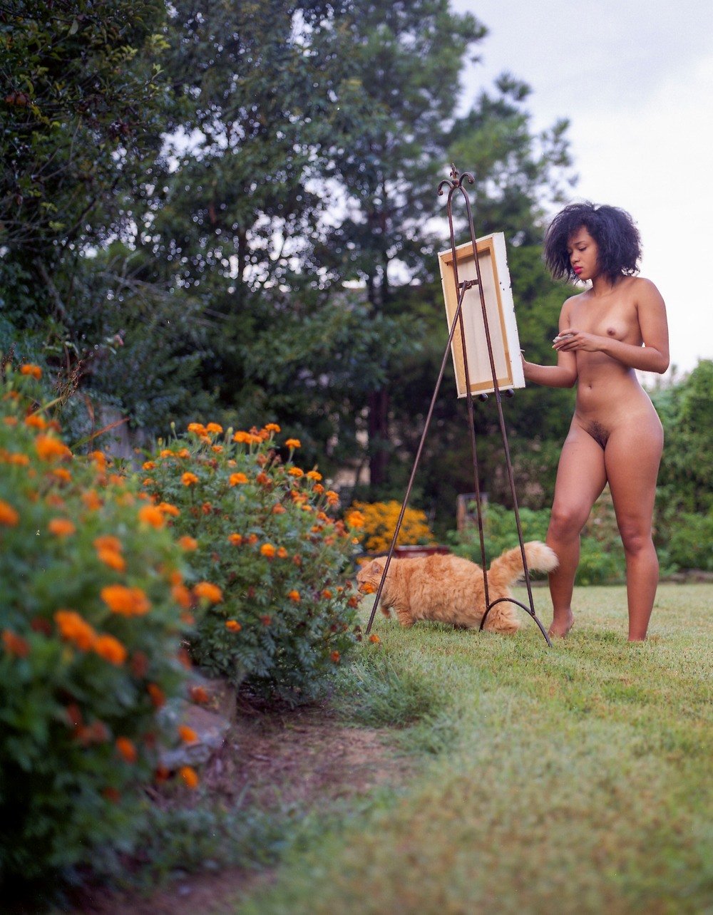 Young nudists show their charms