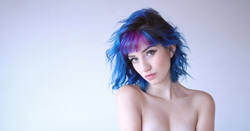 Naked Fay with blue hair in red stockings