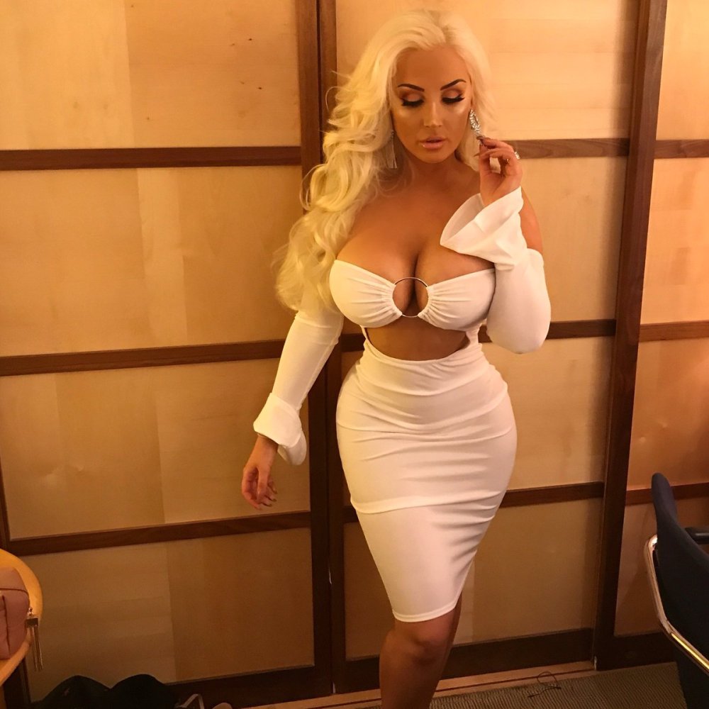 Girl in Big Tits Black dress