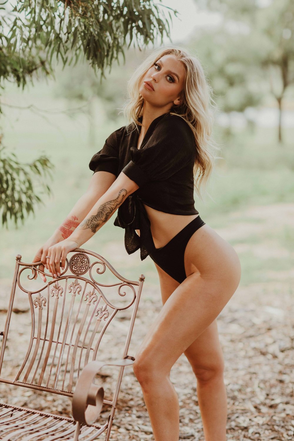 Ashley Resch in a dress