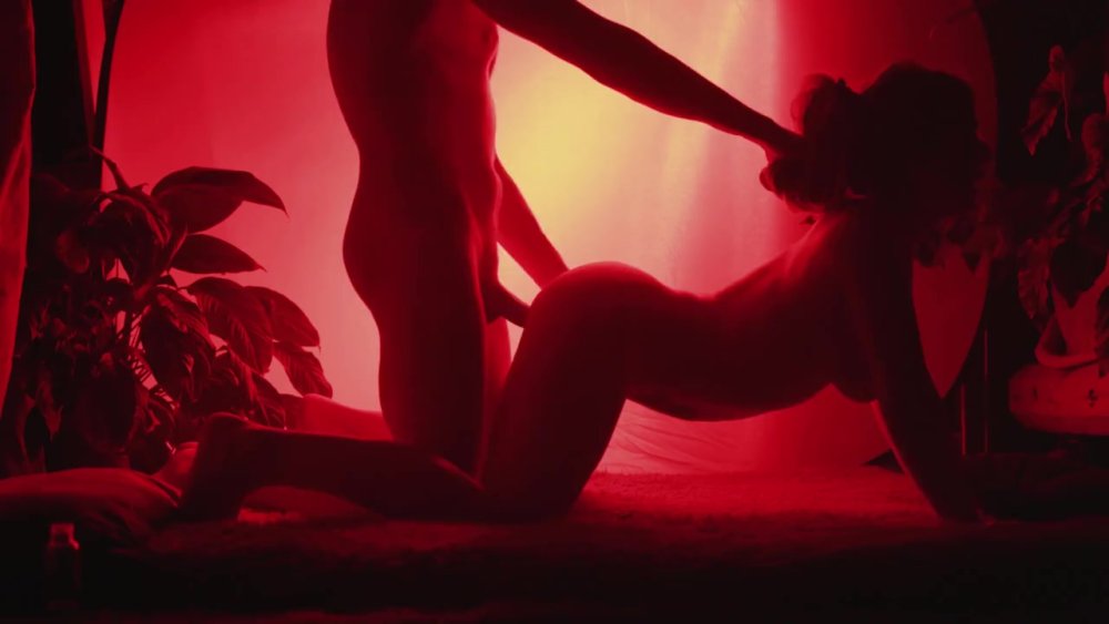 Naked female breasts in the dark