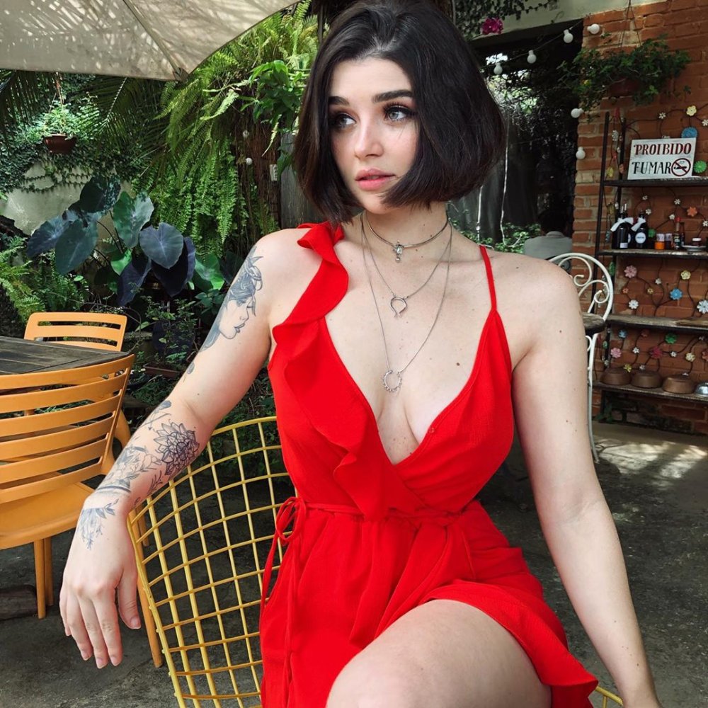 Mia Alves smiles