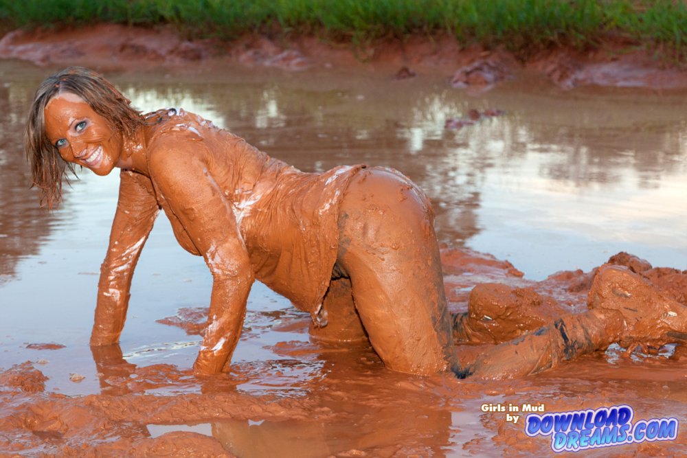 Naked girls bathed in mud