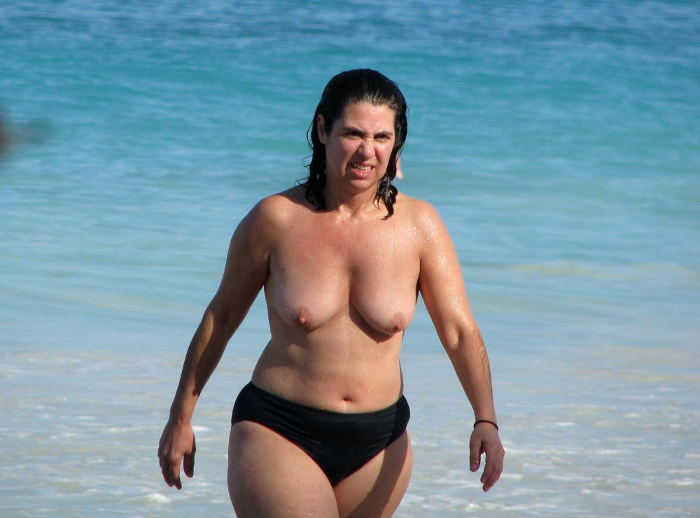 Fat women on the beach topless