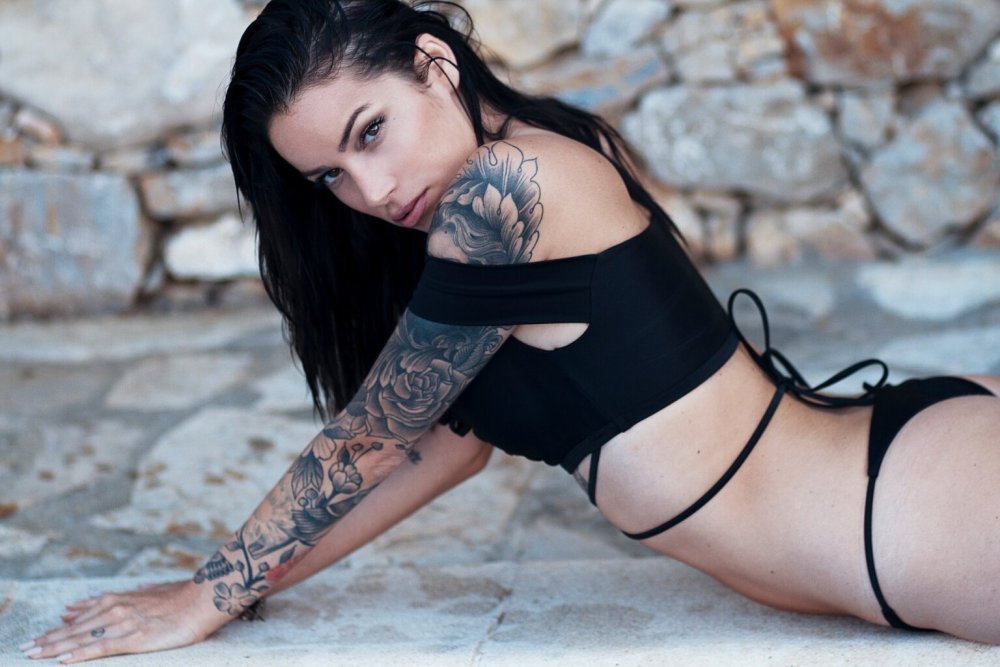 Model Patricia in tattoos