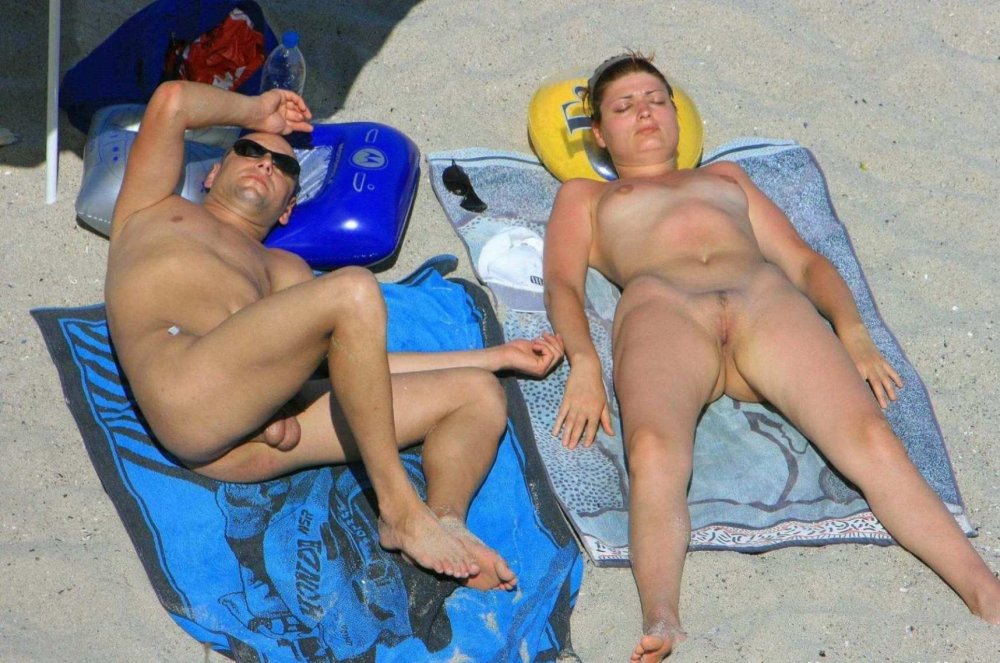 Drunk naked women on the beach
