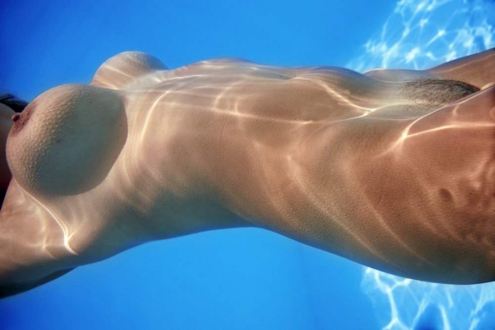 Naked boobs under water
