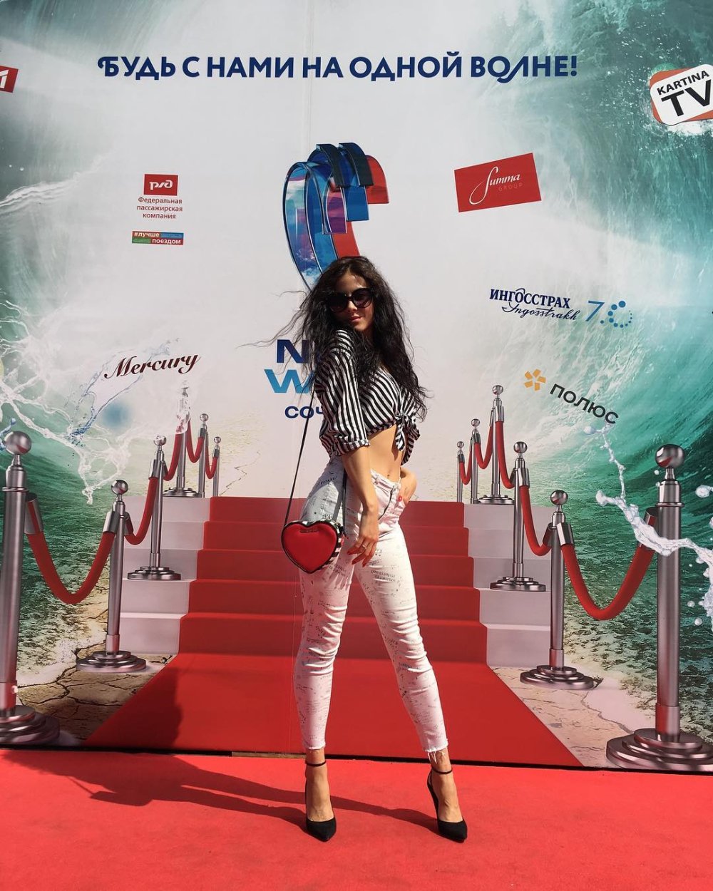 Anastasia Kozhevnikova in jeans