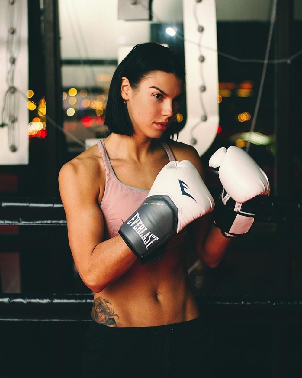 Naked female kickboxing