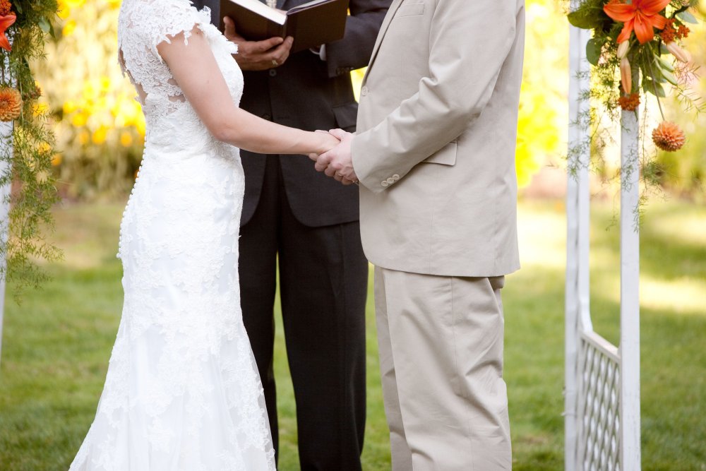 The bride and groom at the altar