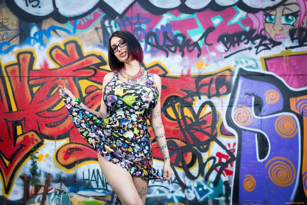 Photo shoot on the background of graffiti girls