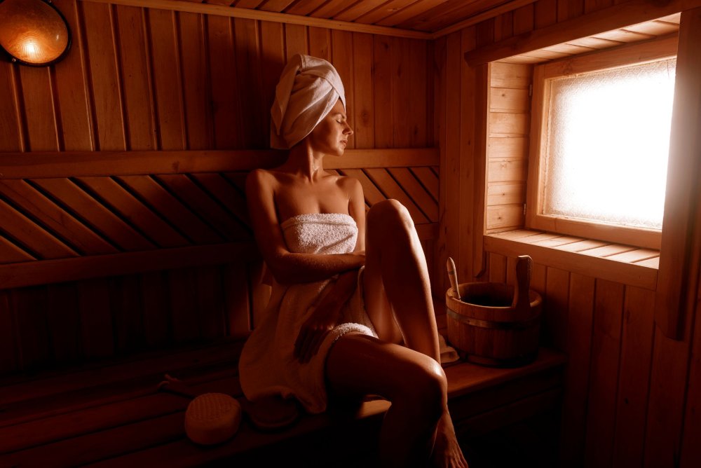 A fashion model in a bathhouse