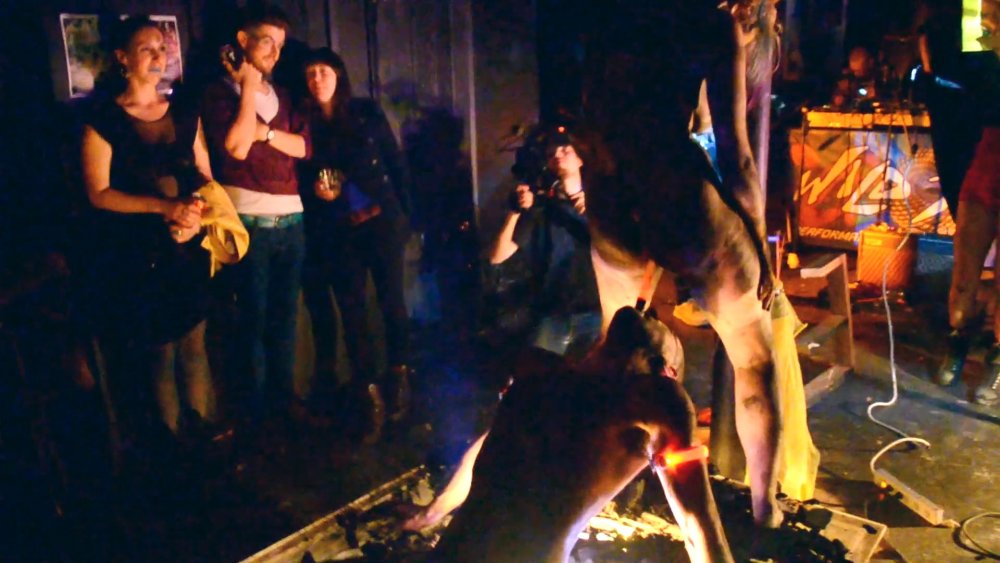 Naked musicians on stage