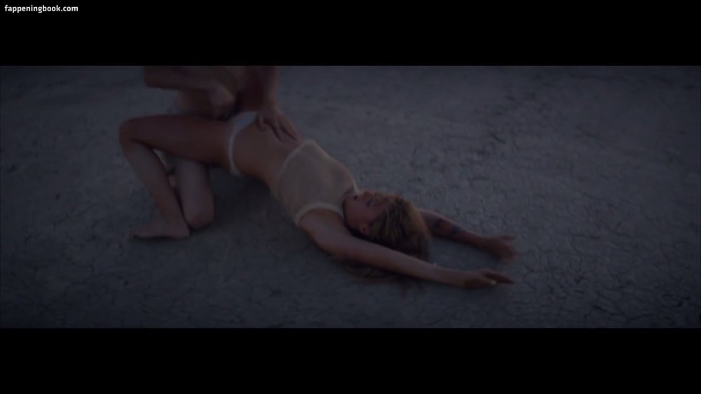 Beautiful naked woman sits