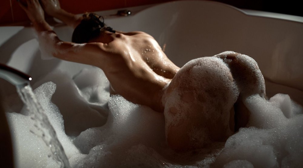 Beautiful naked women in the bathroom