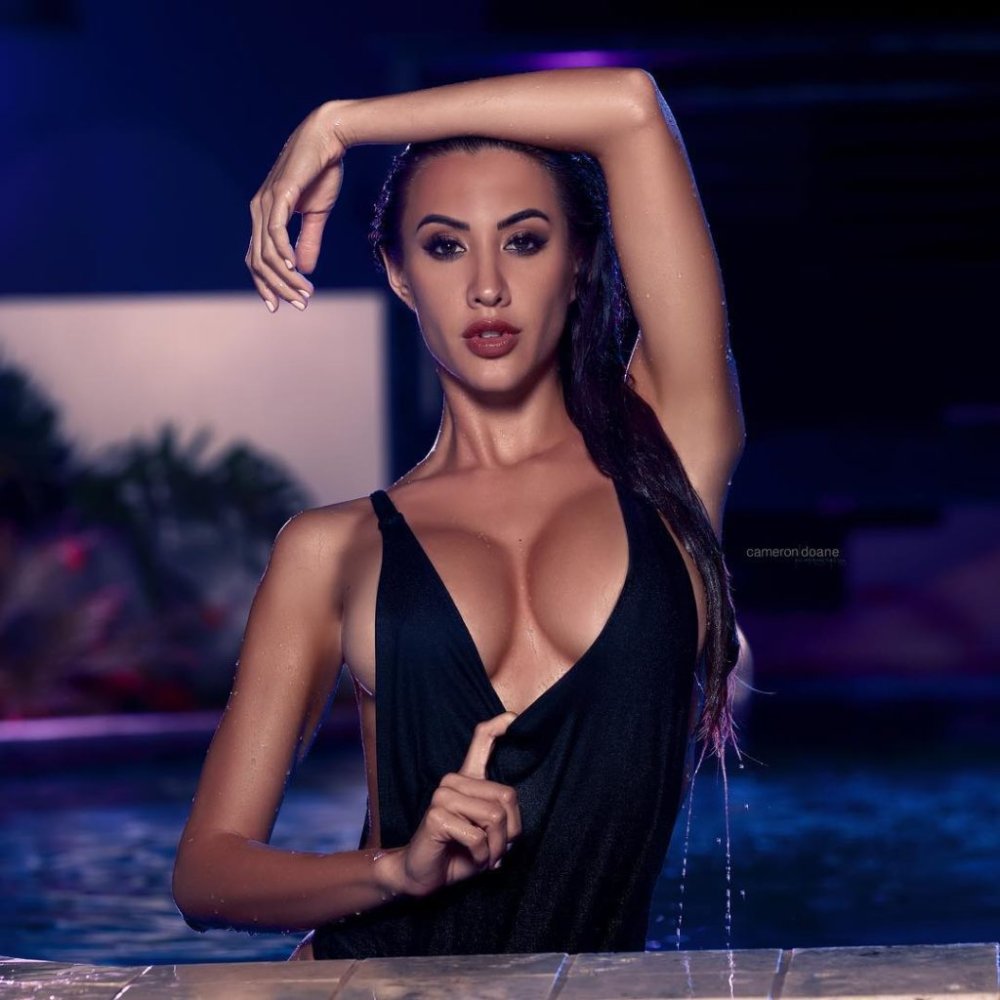 Corrie Yee in a dress