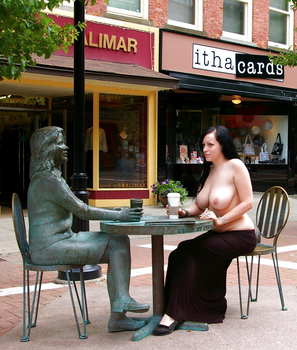 Naked woman at the table