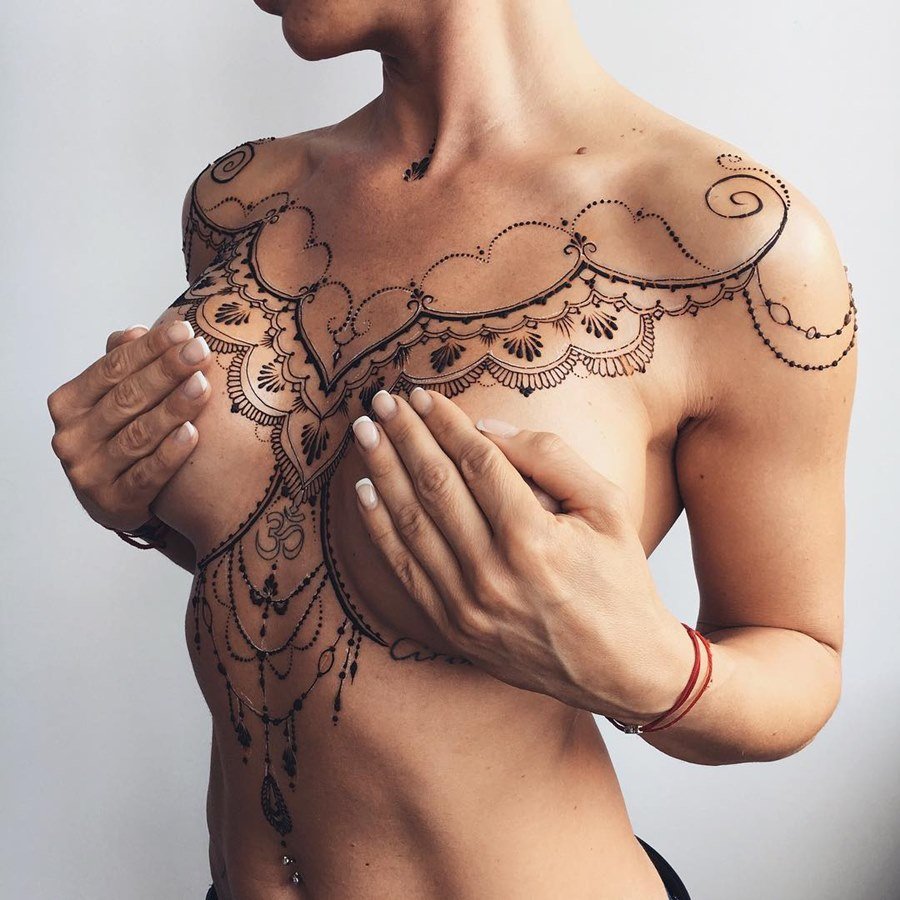 Beautiful female tattoos on the chest
