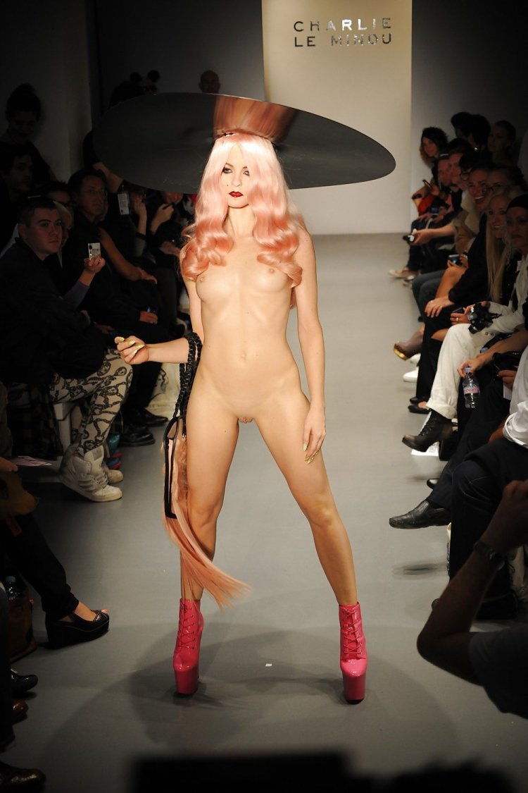 Naked fashion model on the catwalk