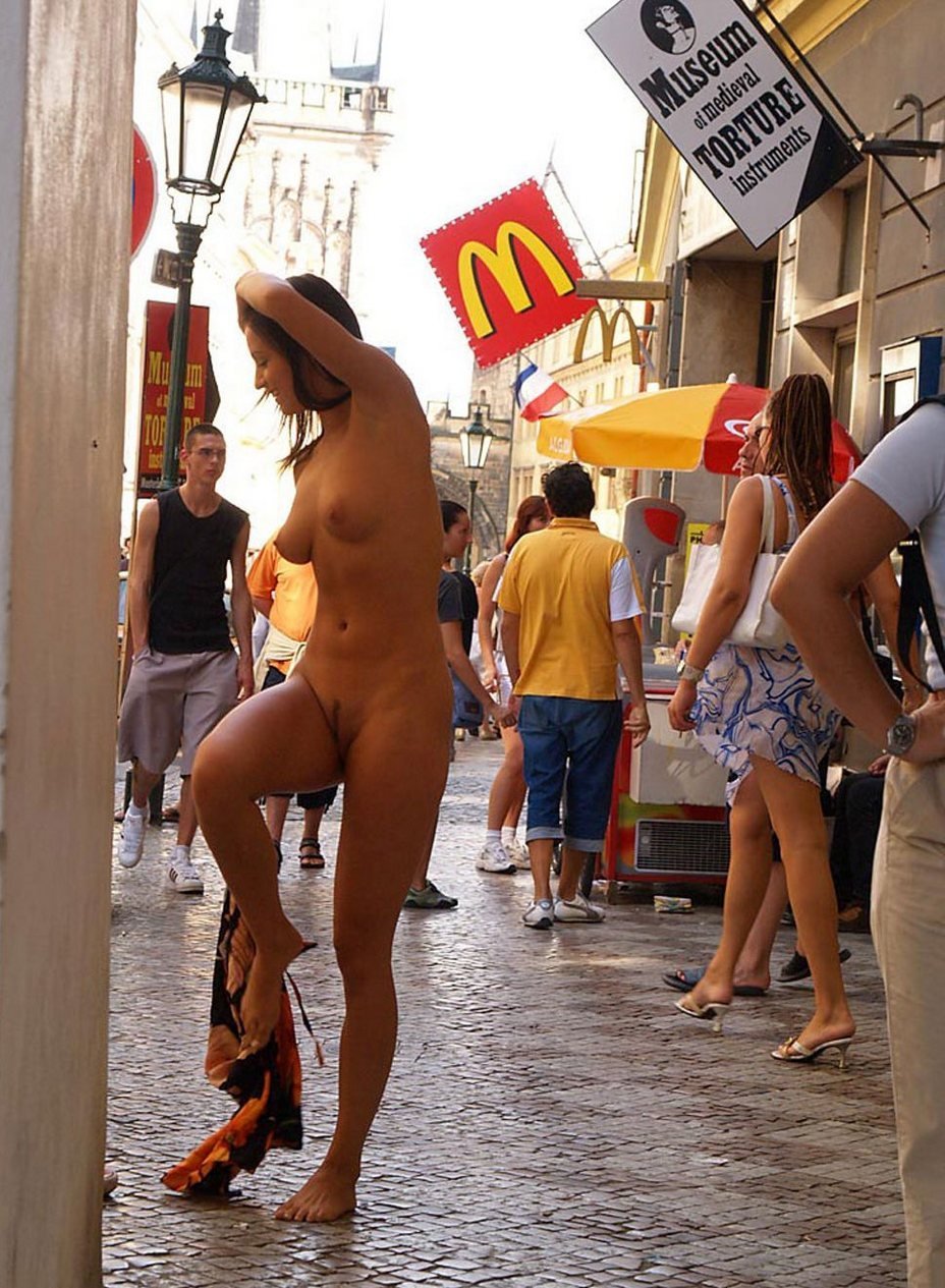 Naked women walk on the street