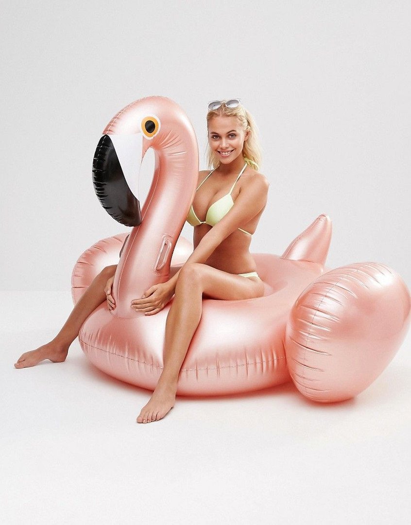 Girl on pink flamingos in Moscow River