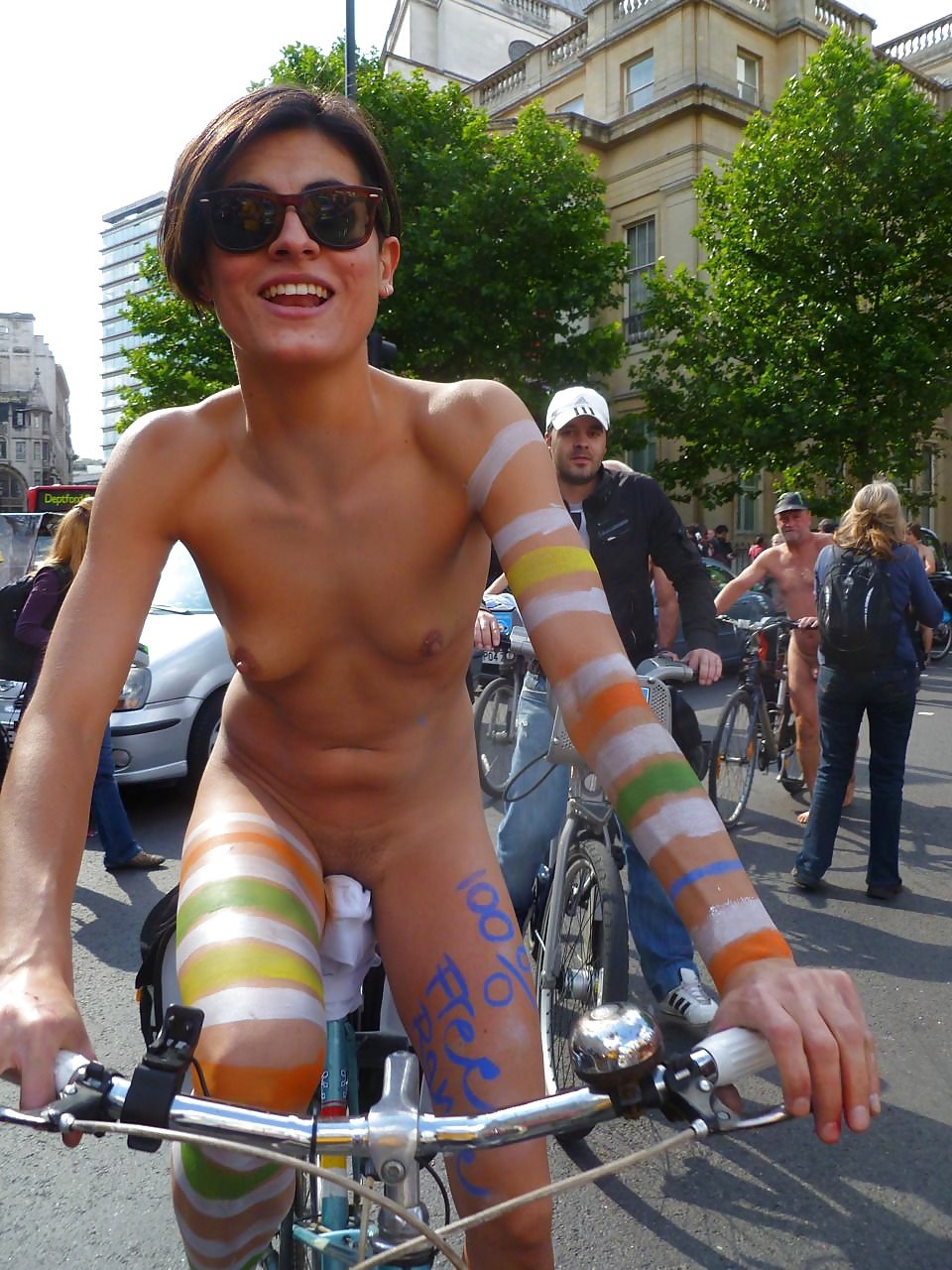 Naked women on a bicycle
