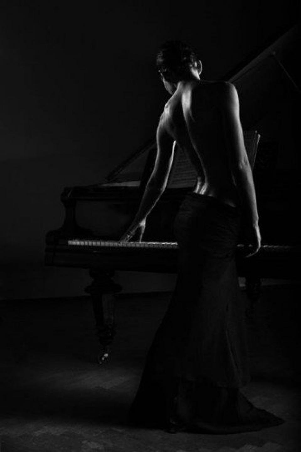 A woman on a piano