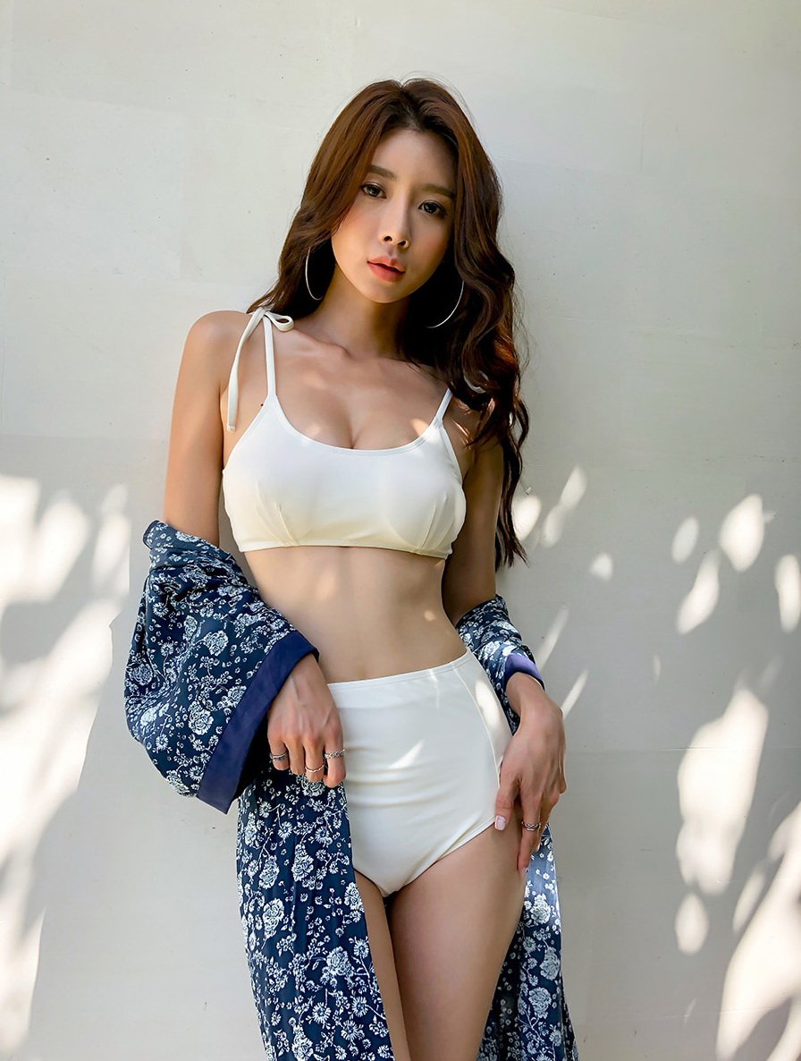 A beautiful Asian lies