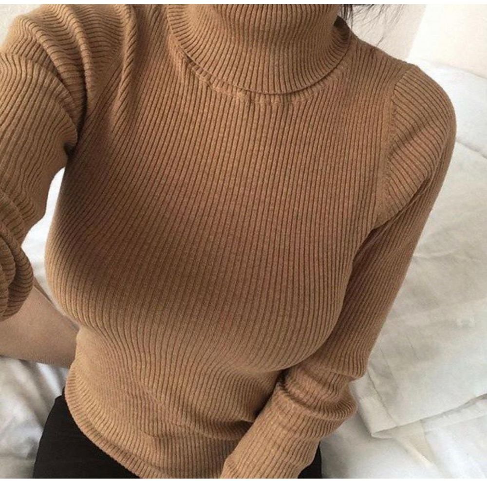 Sexy beauty in a sweater