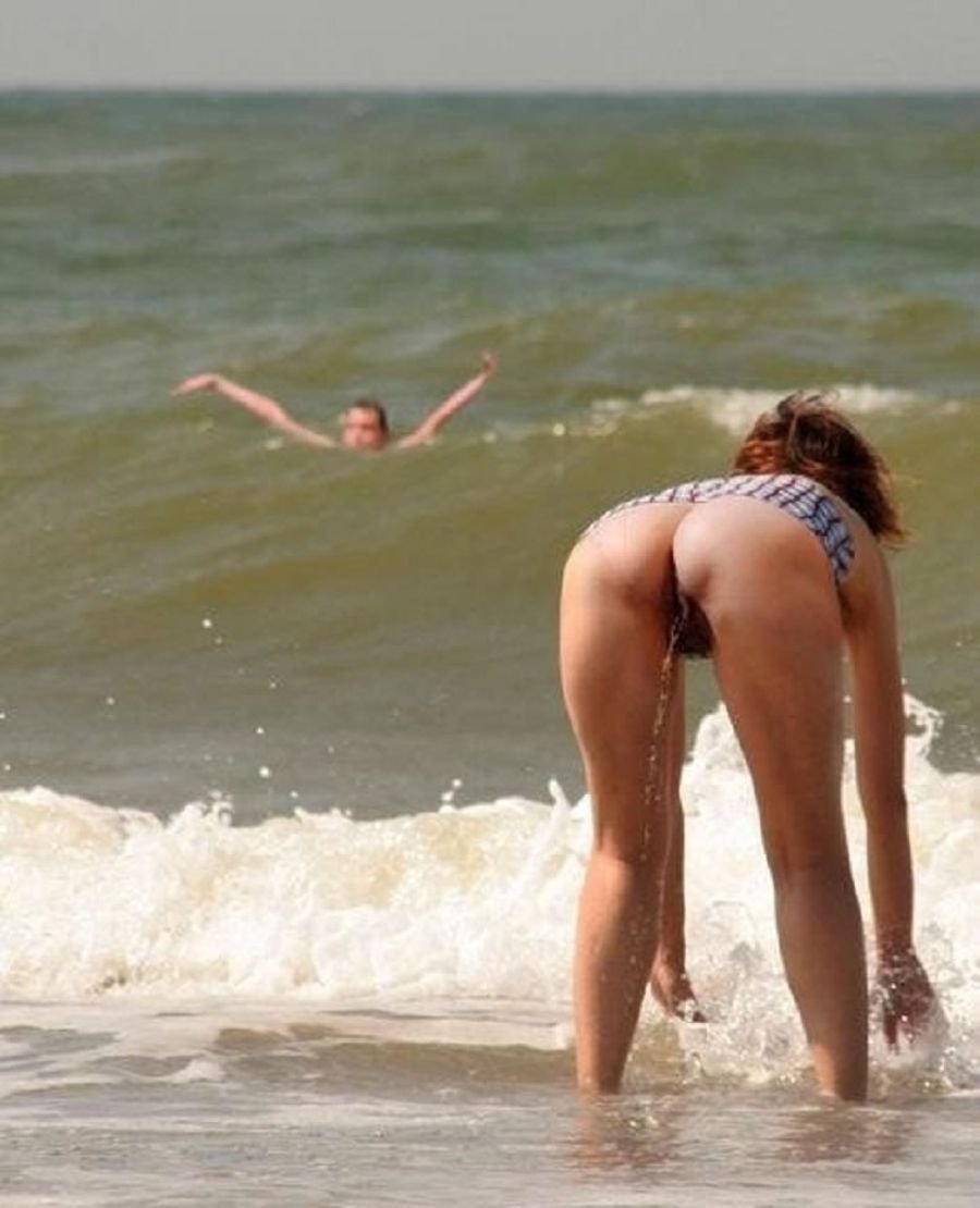 Beautiful women's butt on the beach