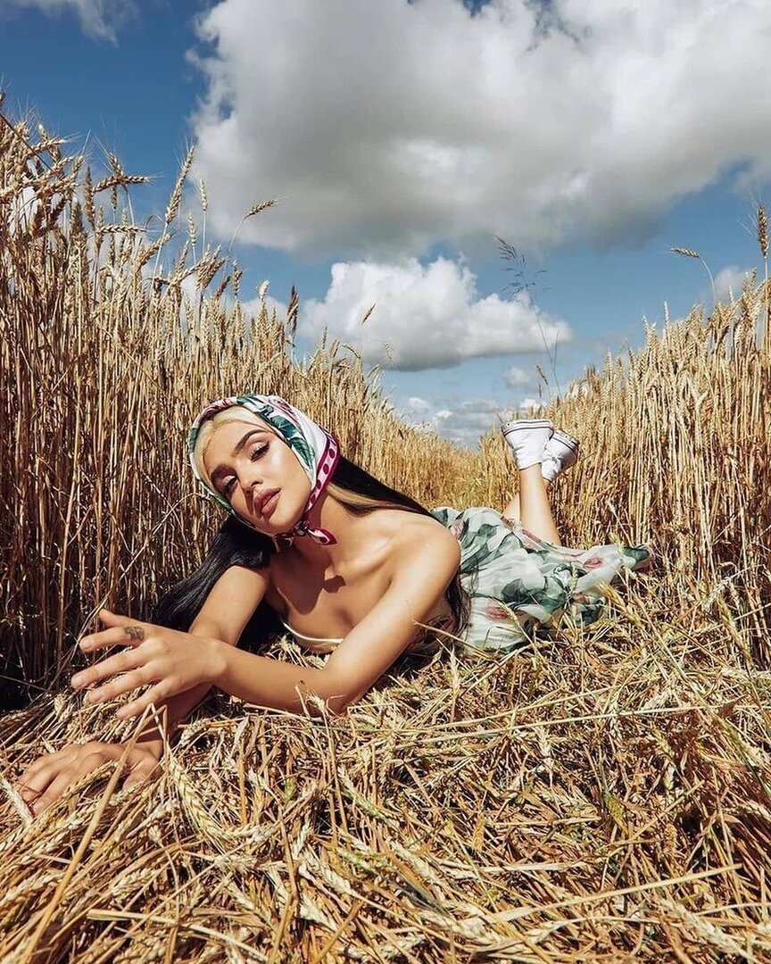 Beautiful girl in linen lies