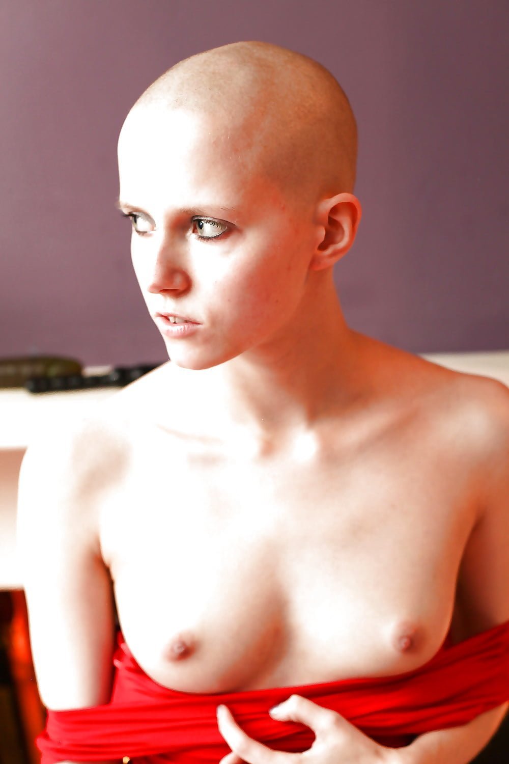 Naked women with a shaved head