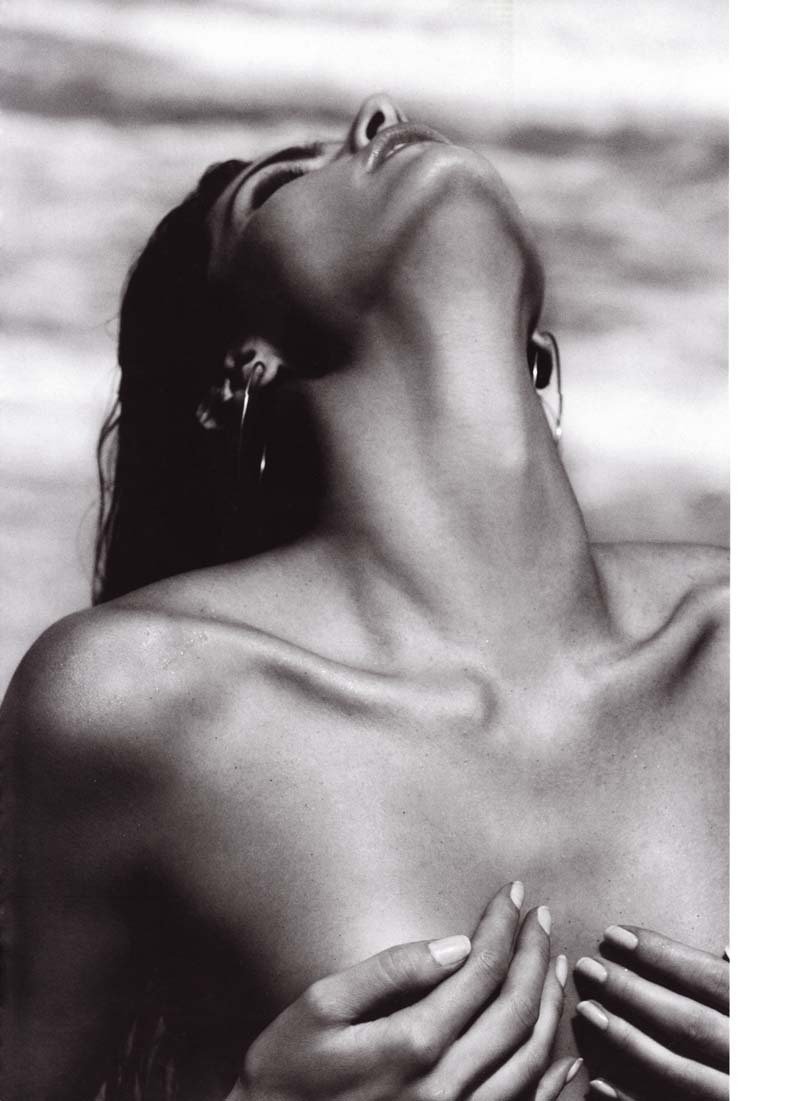 An embarrassed naked woman