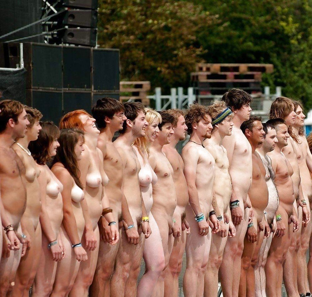 Naked young nudists on the beach