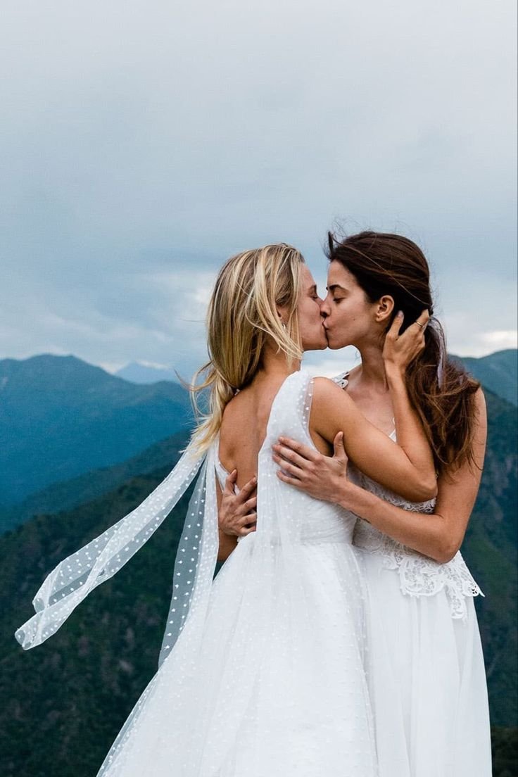 Two girls in wedding dresses