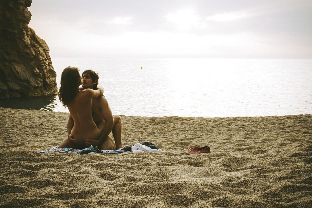 Naked couples on the beach