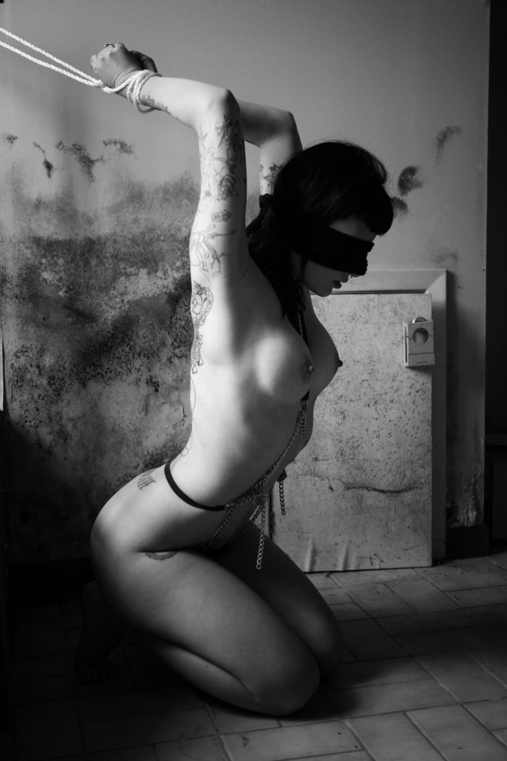 Girls are naked in shackles