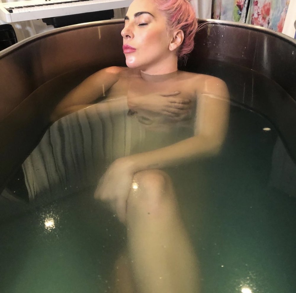 Lady Gaga stretching on the chest