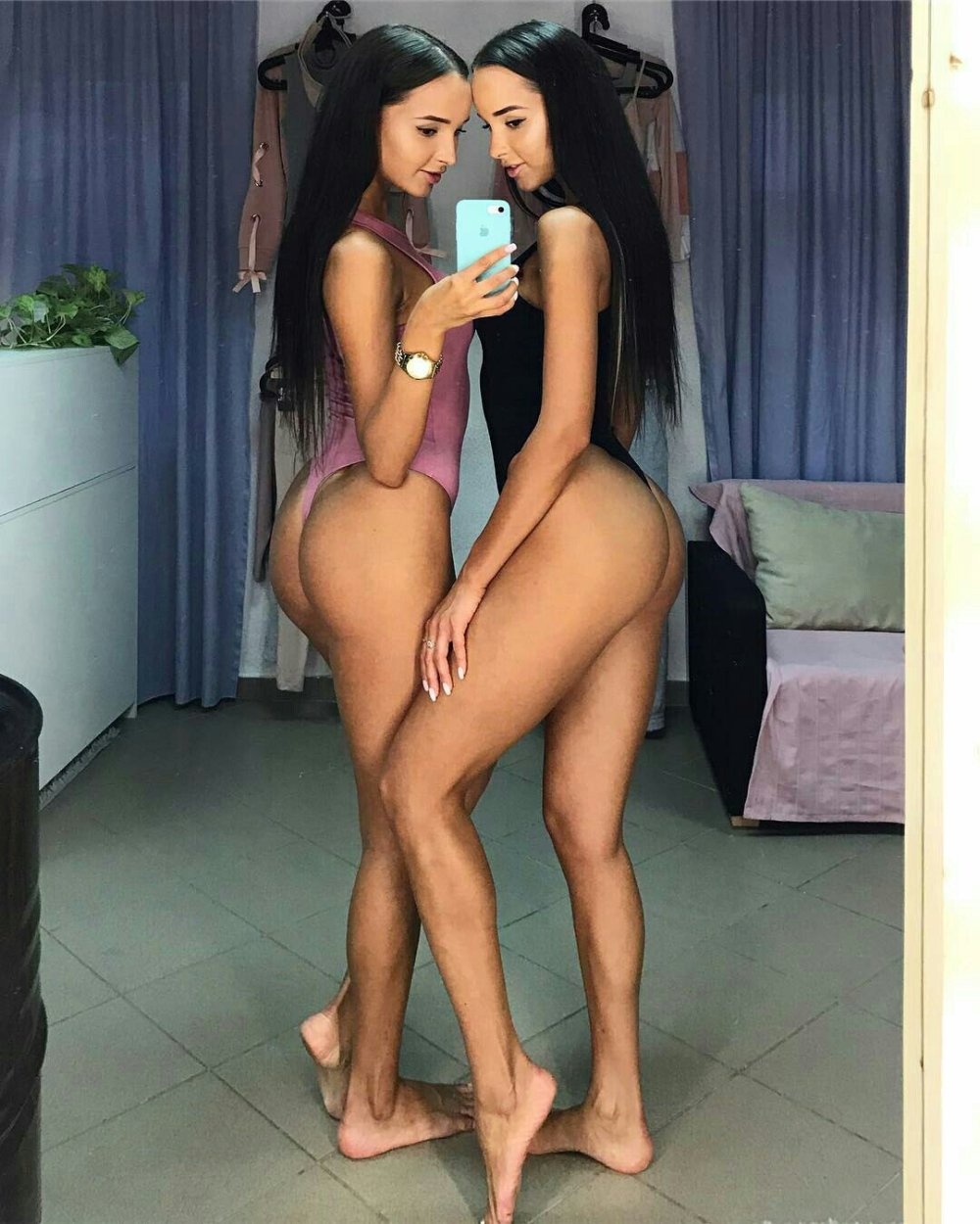 Naked twins with big tits