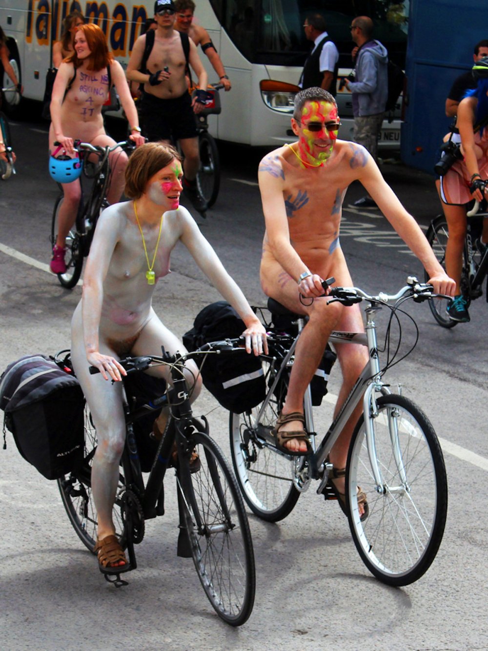 Naked bicycle racing girls