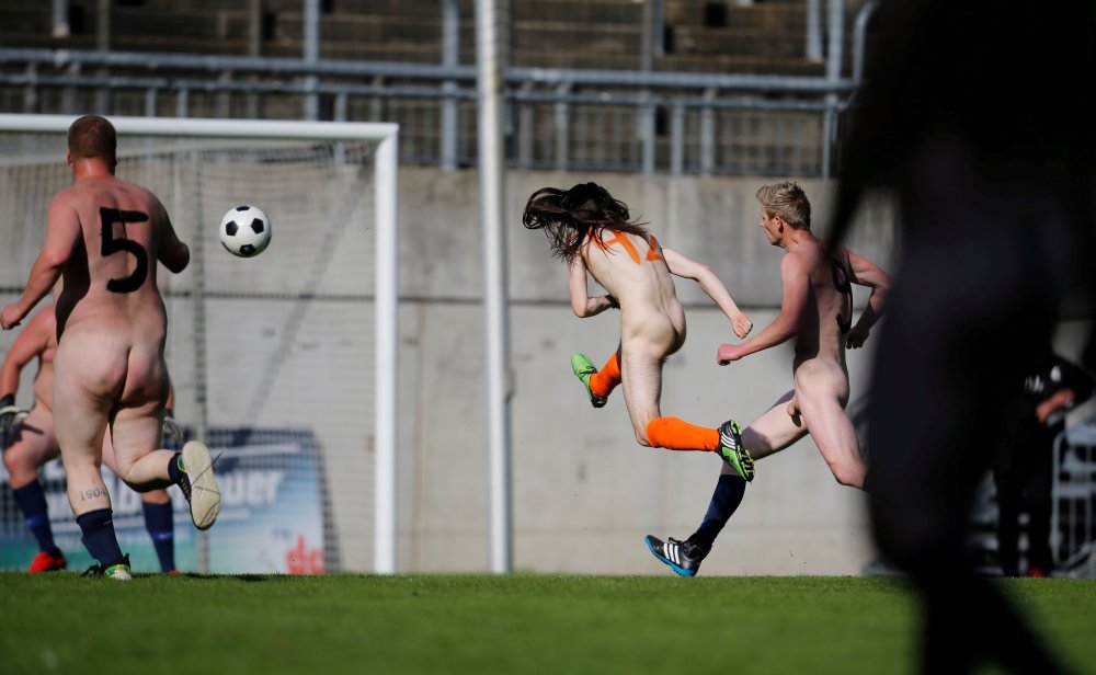 Naked women football players