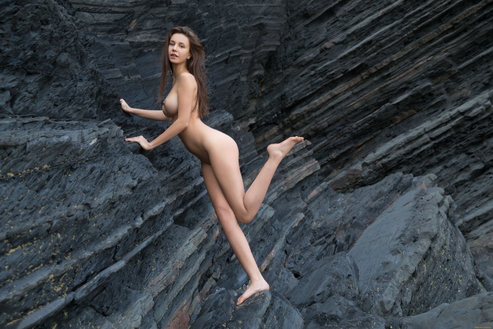 Girl naked in sea waves
