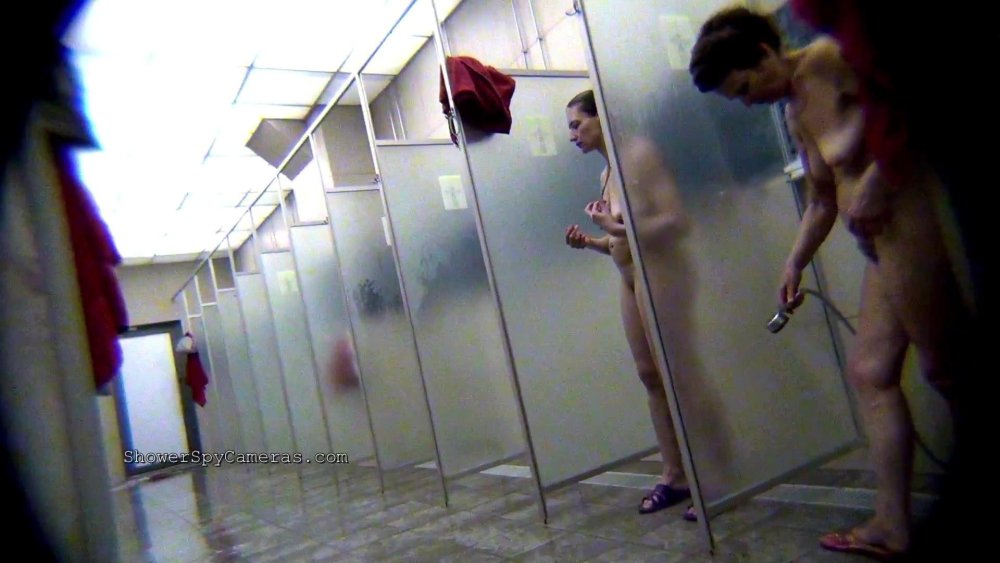 Many naked women wash